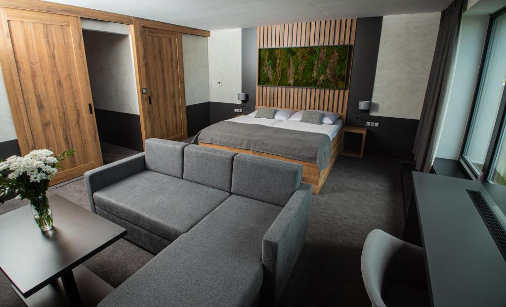 Voodi või voodid majutusasutuse Hotel Kras toas
