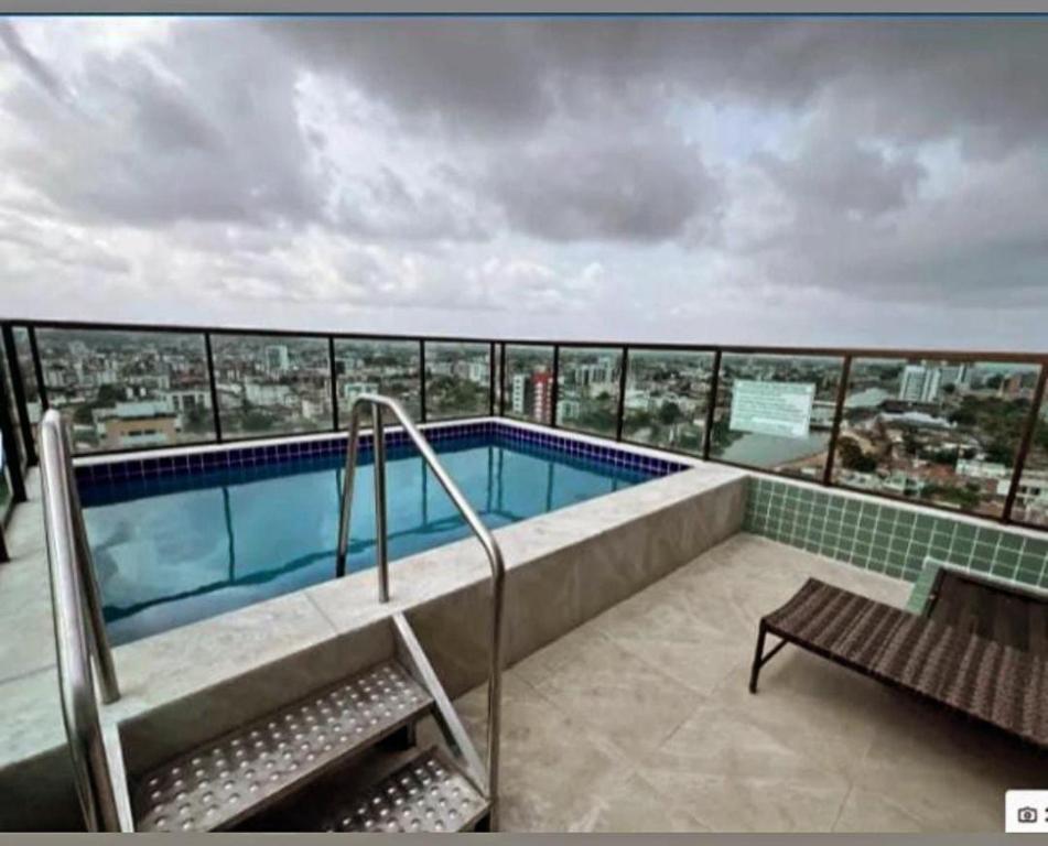 Bazén v ubytování Monteiro HOME SERVICE nebo v jeho okolí