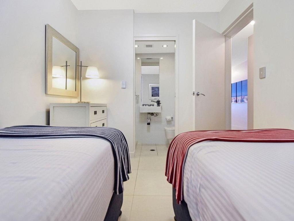 Postel nebo postele na pokoji v ubytování Fairshore