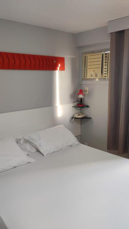 Postel nebo postele na pokoji v ubytování Boa Viagem Flat BVF 777