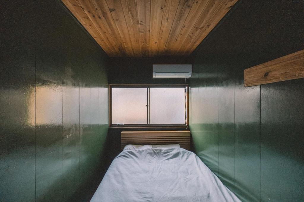 Postel nebo postele na pokoji v ubytování guesthouse TANDEM