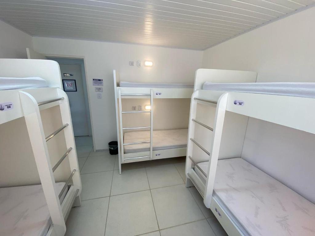 Postel nebo postele na pokoji v ubytování AFS LOFT HOSTEL Aracaju