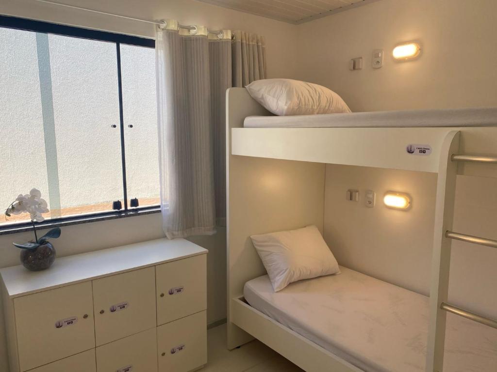 Postel nebo postele na pokoji v ubytování AFS LOFT HOSTEL Aracaju