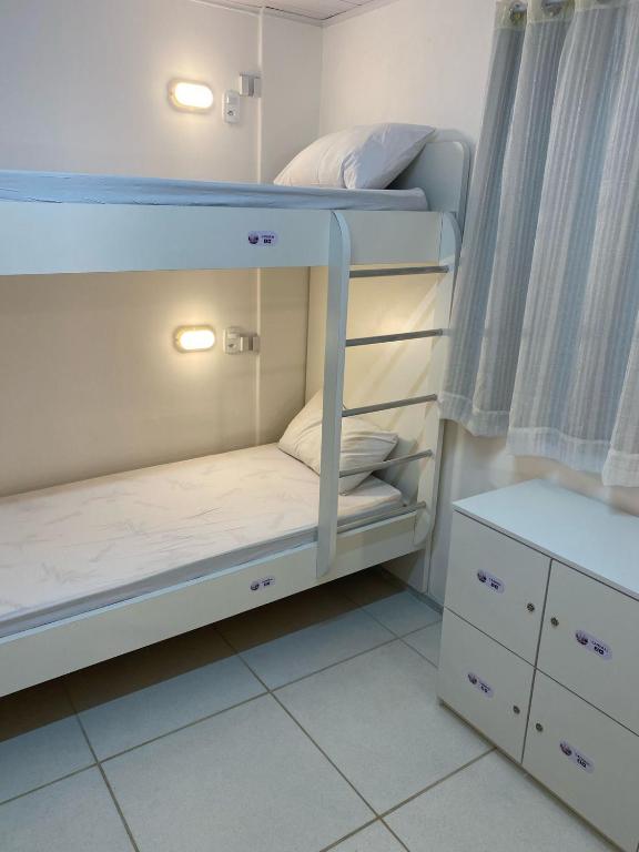 Postel nebo postele na pokoji v ubytování AFS LOFT HOSTEL Aracaju