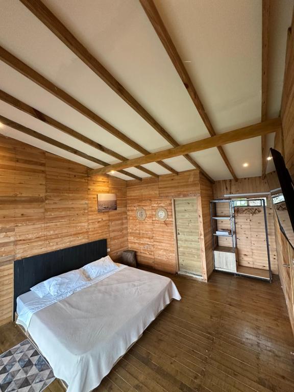 Postel nebo postele na pokoji v ubytování Luxury Tiny House - Minca