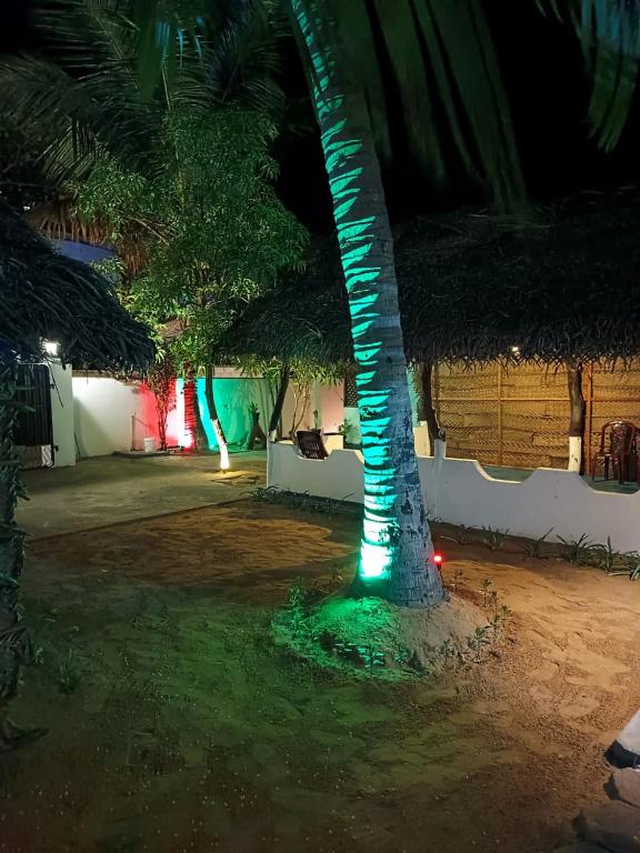 Zahrada ubytování Seaside Inn Arugambay