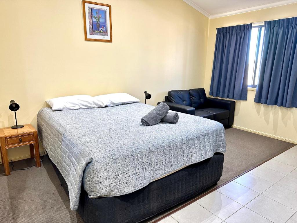 Postel nebo postele na pokoji v ubytování Moura Motel