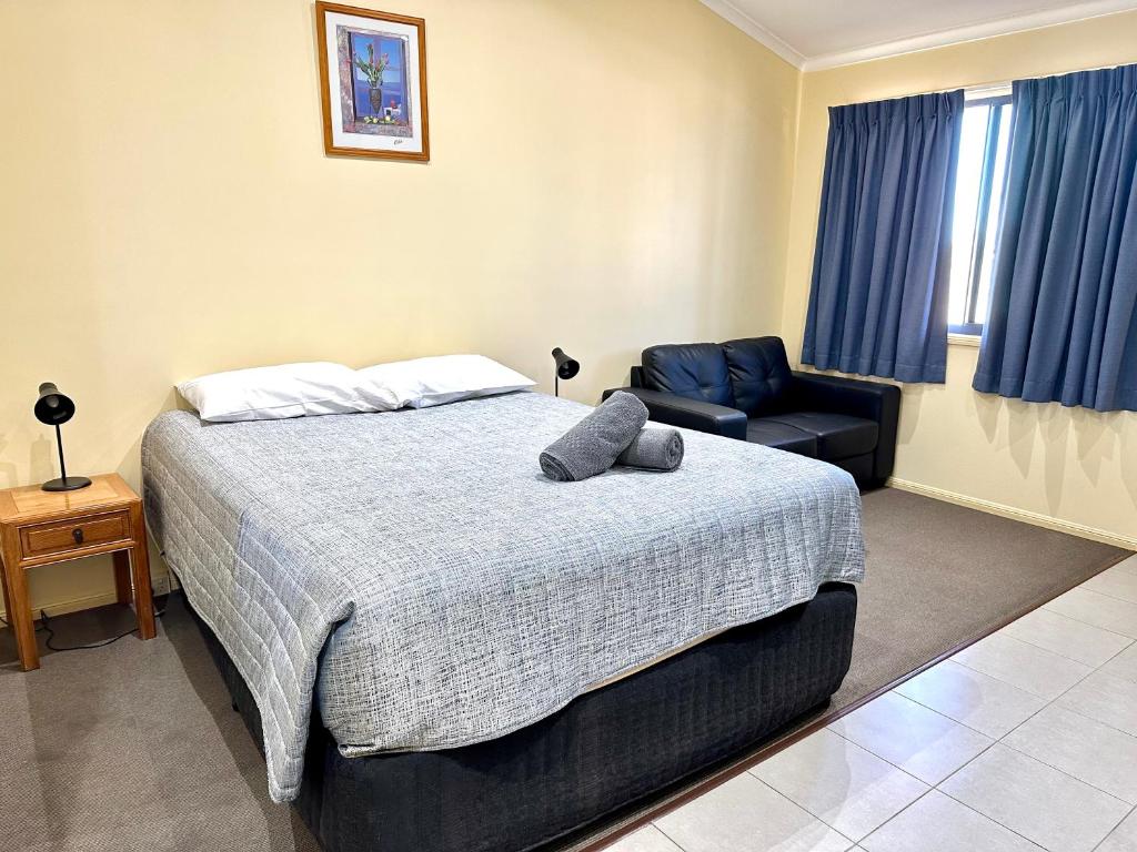 Postel nebo postele na pokoji v ubytování Moura Motel