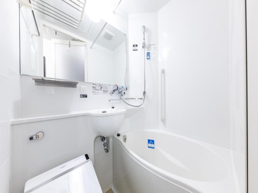 Koupelna v ubytování APA Hotel Wakayama