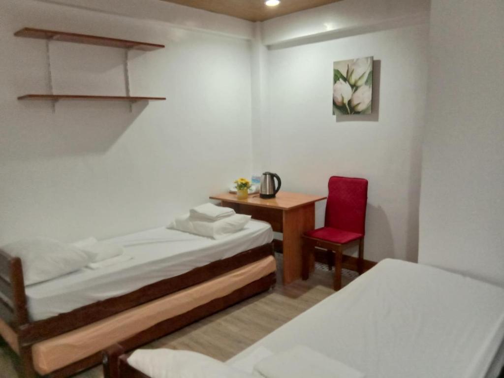 Postel nebo postele na pokoji v ubytování JCV Rooms