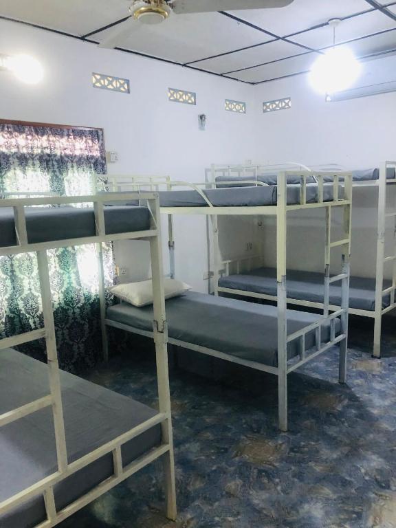 Postel nebo postele na pokoji v ubytování Trinco Be Cool Hostel