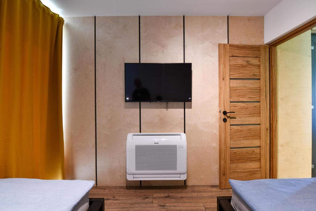 TV a/nebo společenská místnost v ubytování Cube Hills