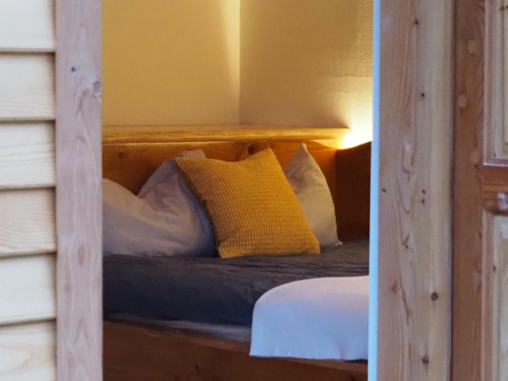 Postel nebo postele na pokoji v ubytování Pastirska hiška