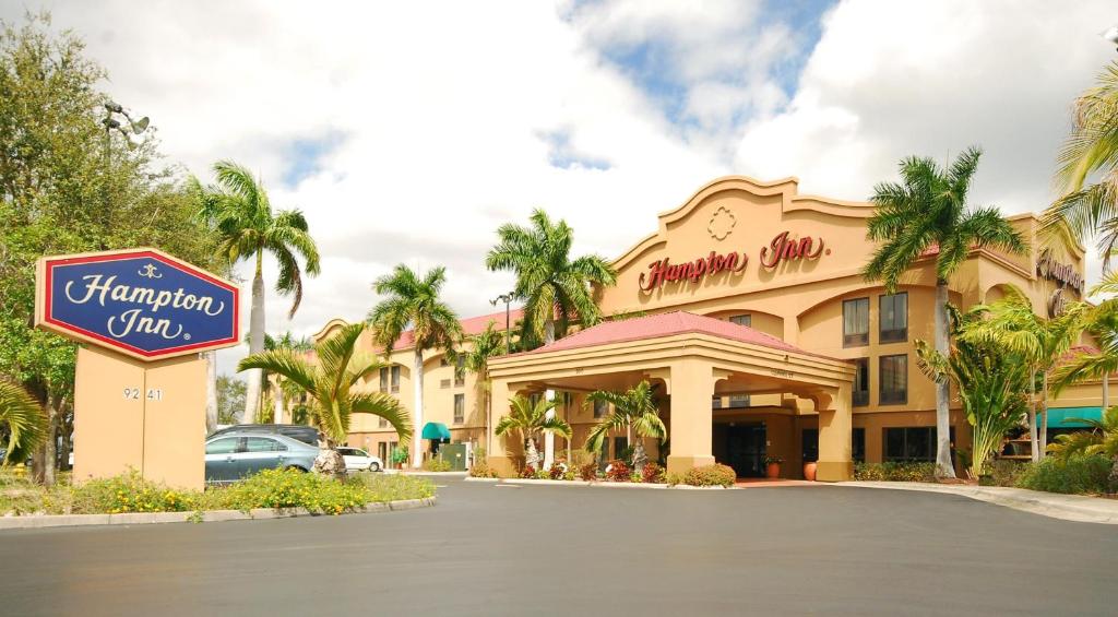 a hotel with a sign that reads flamingo inn at Hampton Inn Fort Myers-Airport & I-75 in Fort Myers