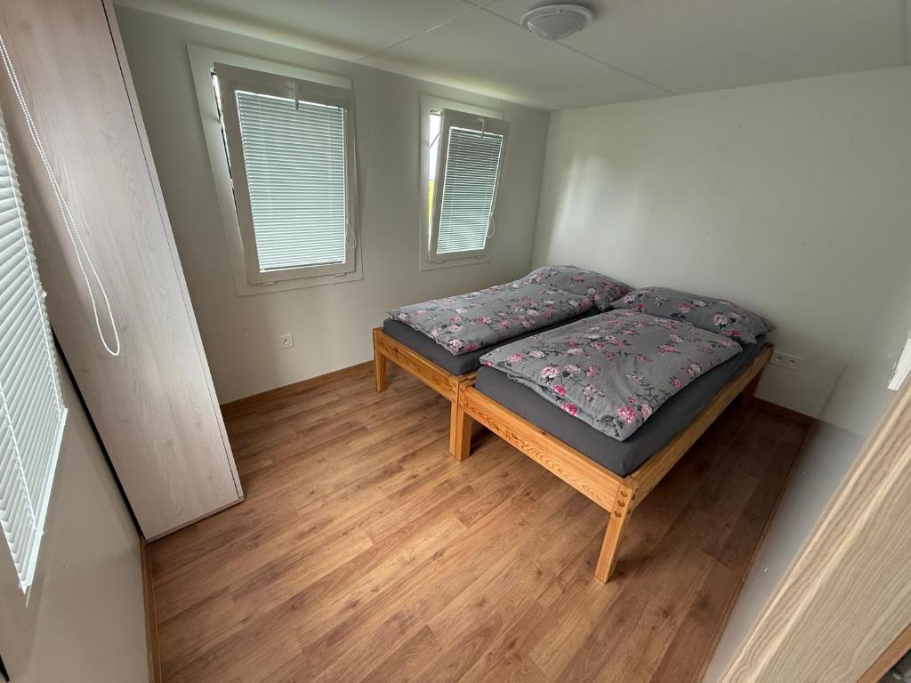 Postel nebo postele na pokoji v ubytování Penzion - Apartman Přestavlky
