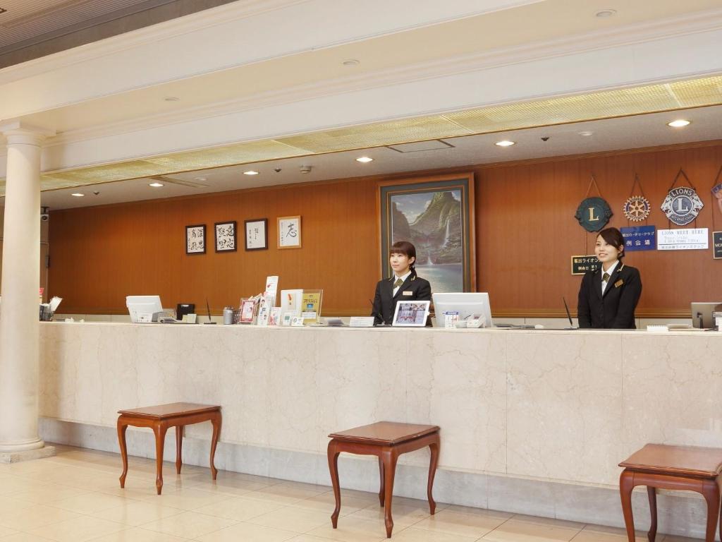 Členové personálu v ubytování Sakaide Grand Hotel