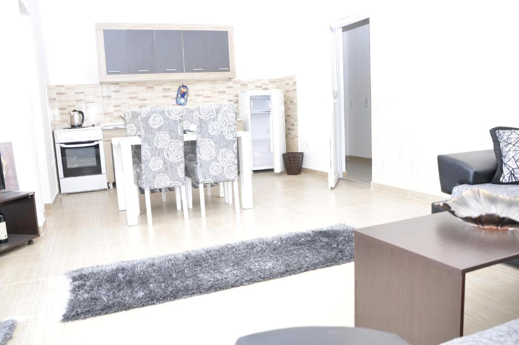 Kuchyň nebo kuchyňský kout v ubytování Apart Hotel S Lux