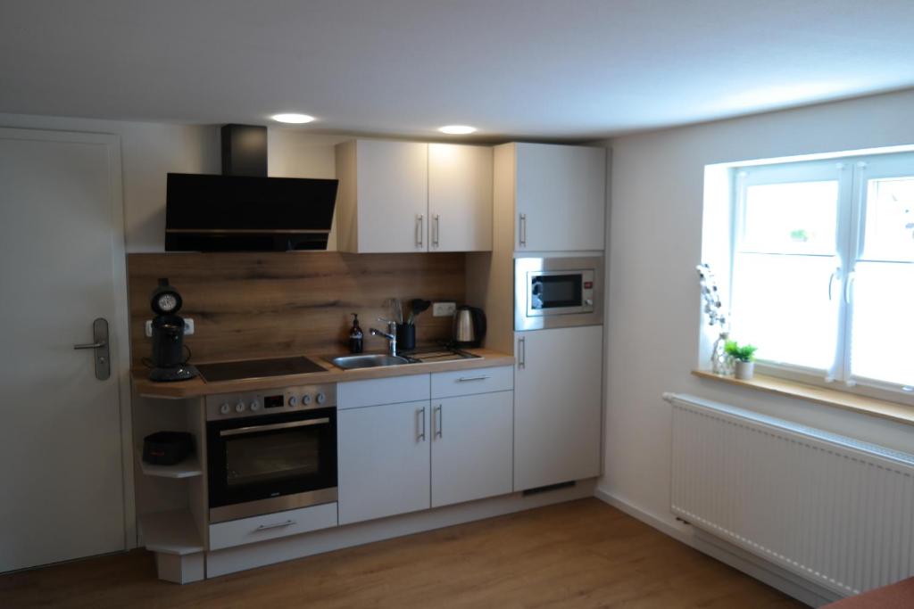 Kuchyň nebo kuchyňský kout v ubytování Apartment 67