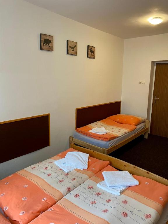 Postel nebo postele na pokoji v ubytování BOUDA MORAVA