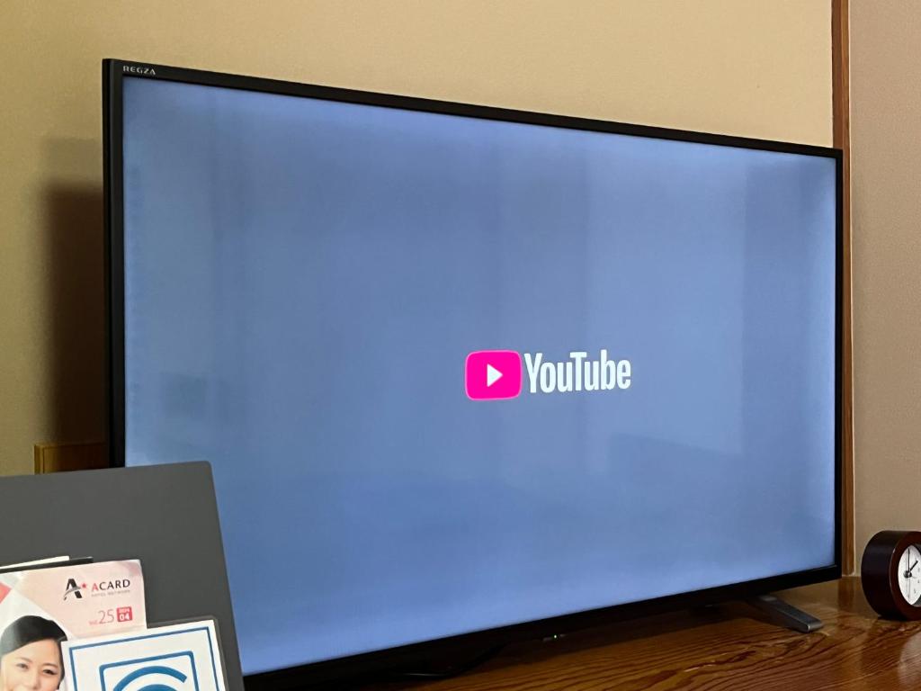 TV a/nebo společenská místnost v ubytování Sakaide Grand Hotel