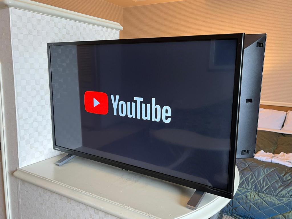 TV a/nebo společenská místnost v ubytování Sakaide Grand Hotel