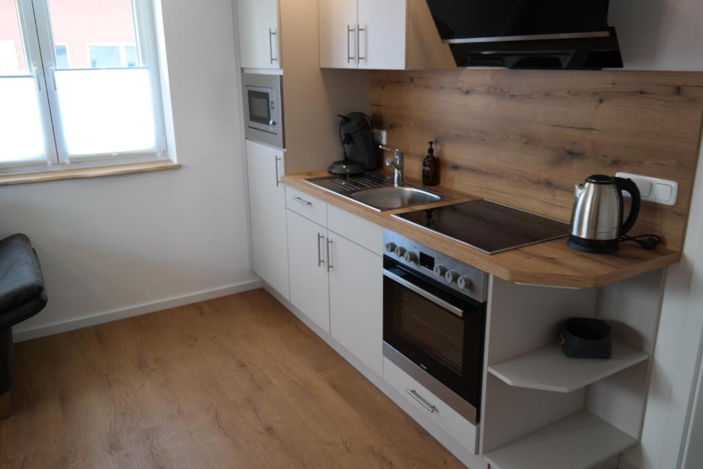 Kuchyň nebo kuchyňský kout v ubytování Apartment 67