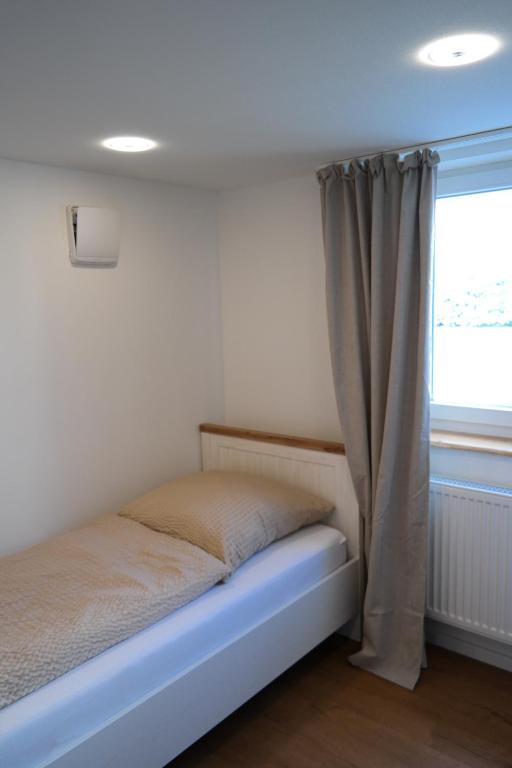 Postel nebo postele na pokoji v ubytování Apartment 67