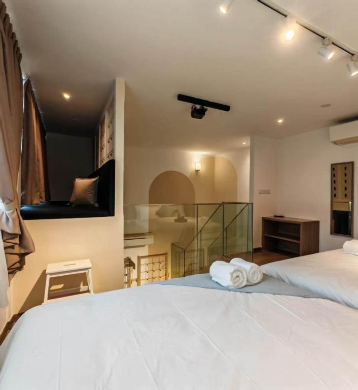 Tempat tidur dalam kamar di Residensi Agile Delima by Times 8