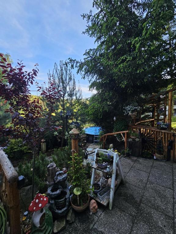 Zahrada ubytování Chata u rybníka - Chrastná
