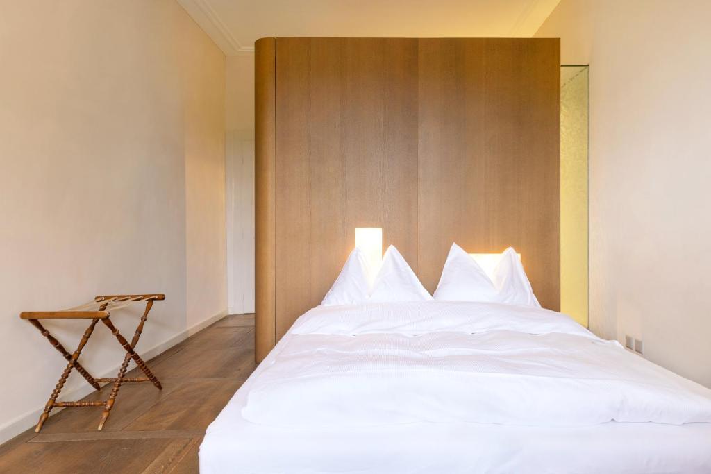 Postel nebo postele na pokoji v ubytování Hotel St Petersinsel
