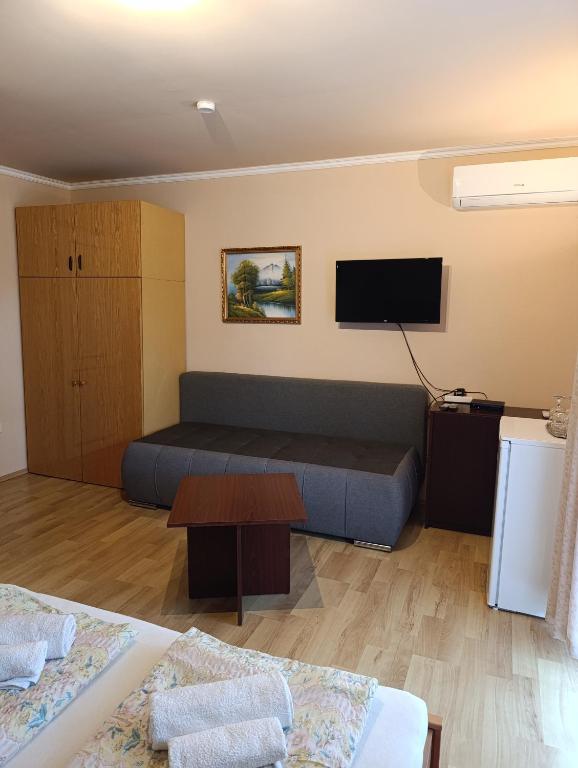 Telewizja i/lub zestaw kina domowego w obiekcie Vitorlás Apartmanház
