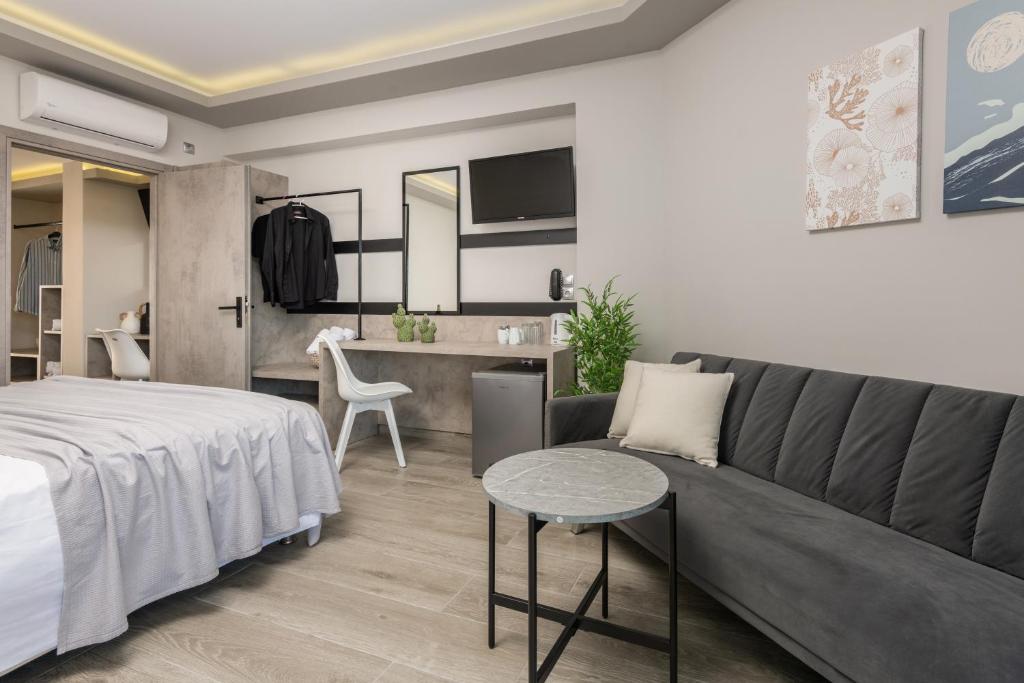 Postel nebo postele na pokoji v ubytování Callinica Hotel