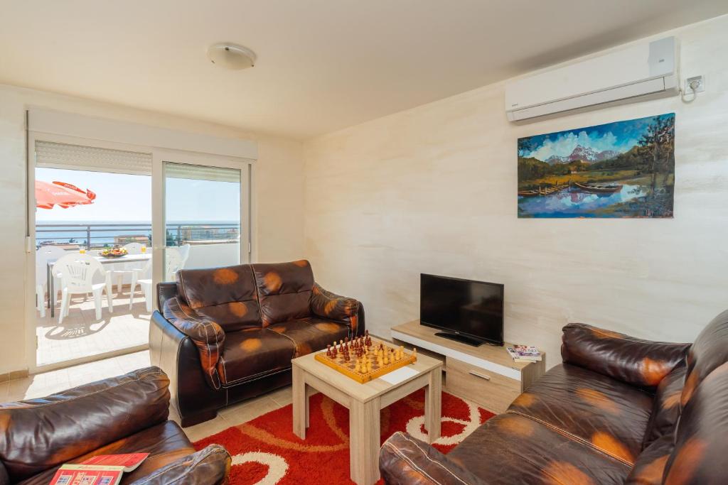 Posezení v ubytování Apart Hotel S Lux