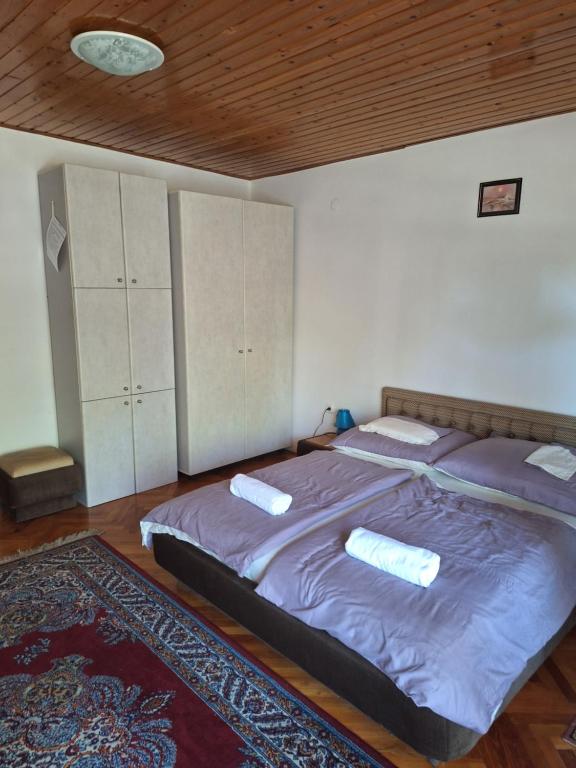 Postel nebo postele na pokoji v ubytování Magyar Csárda és Vendégház