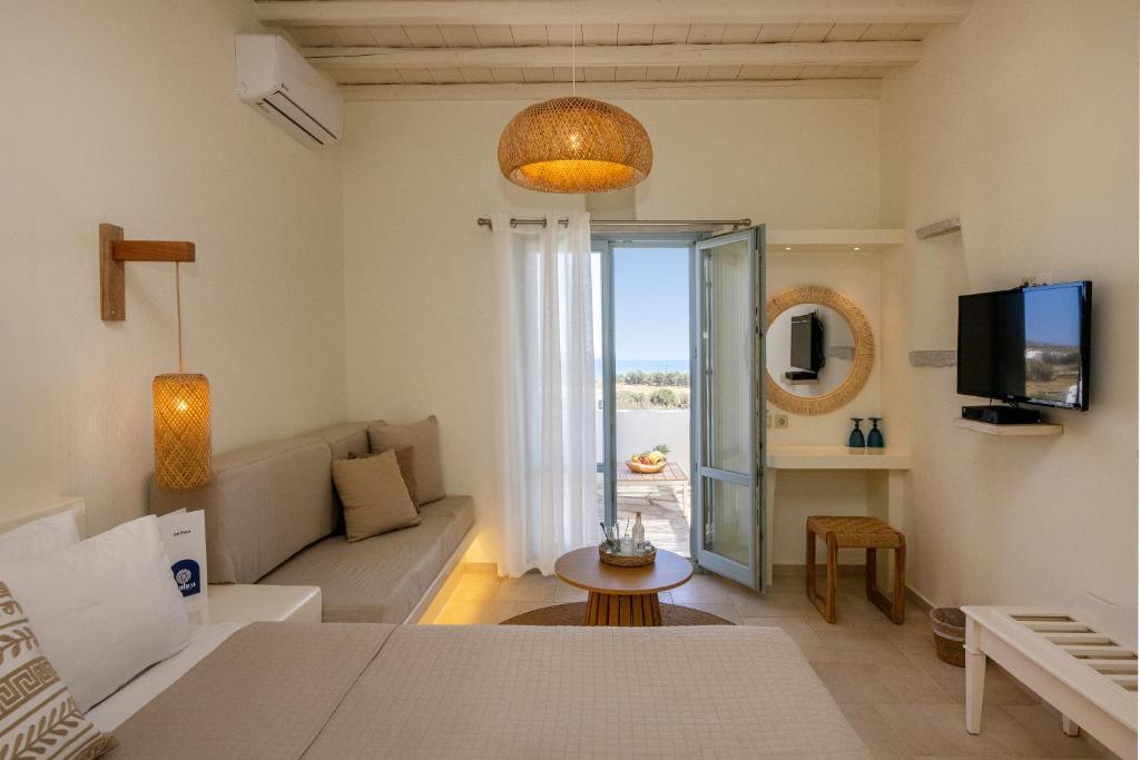 Postel nebo postele na pokoji v ubytování Anthea Hotel