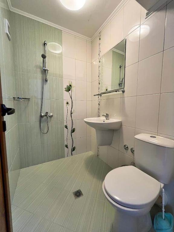 Koupelna v ubytování Family Hotel Helios