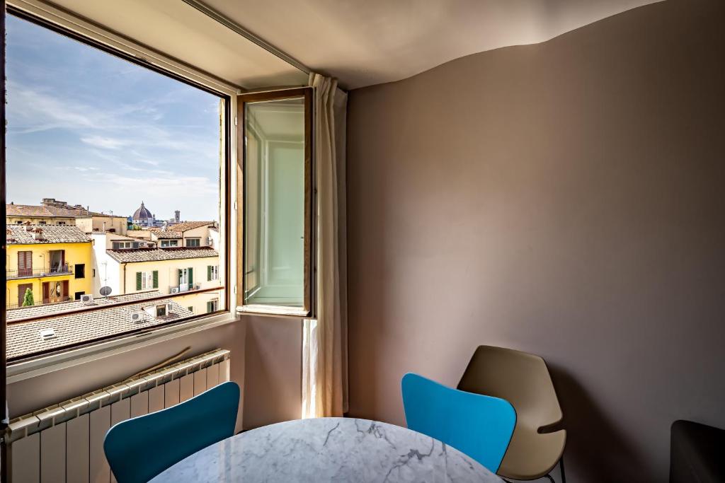 Posedenie v ubytovaní Roommo Fortezza