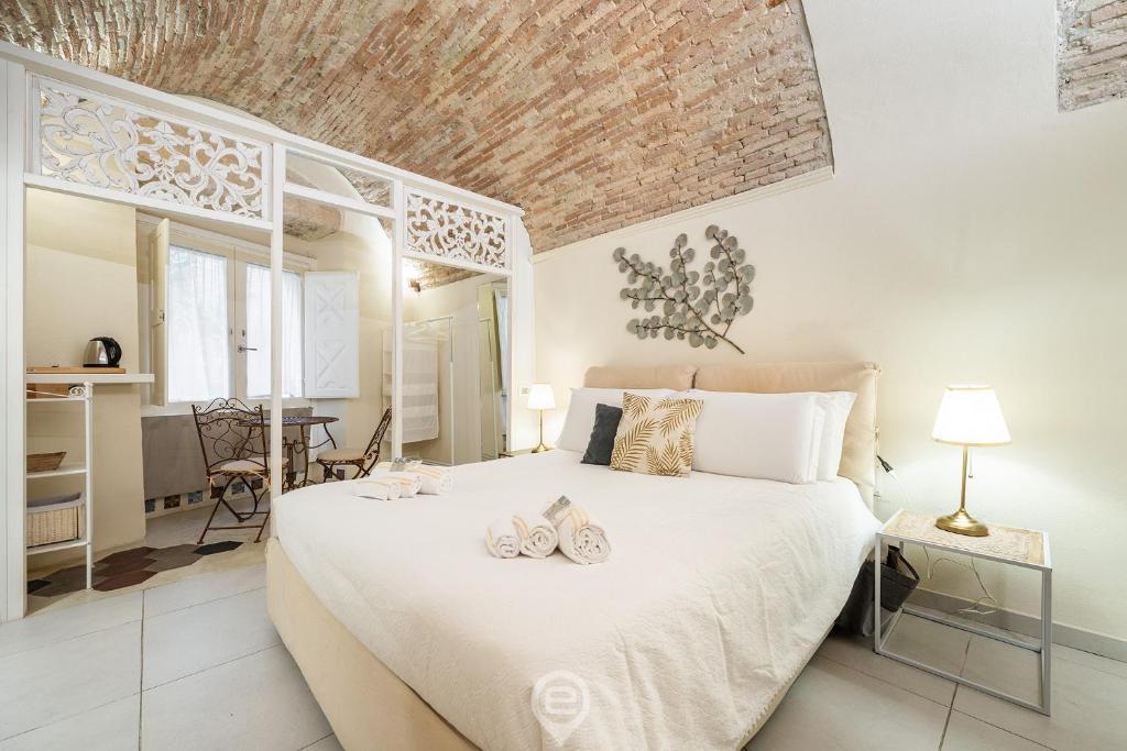 Ένα ή περισσότερα κρεβάτια σε δωμάτιο στο Amo Castle Rooms