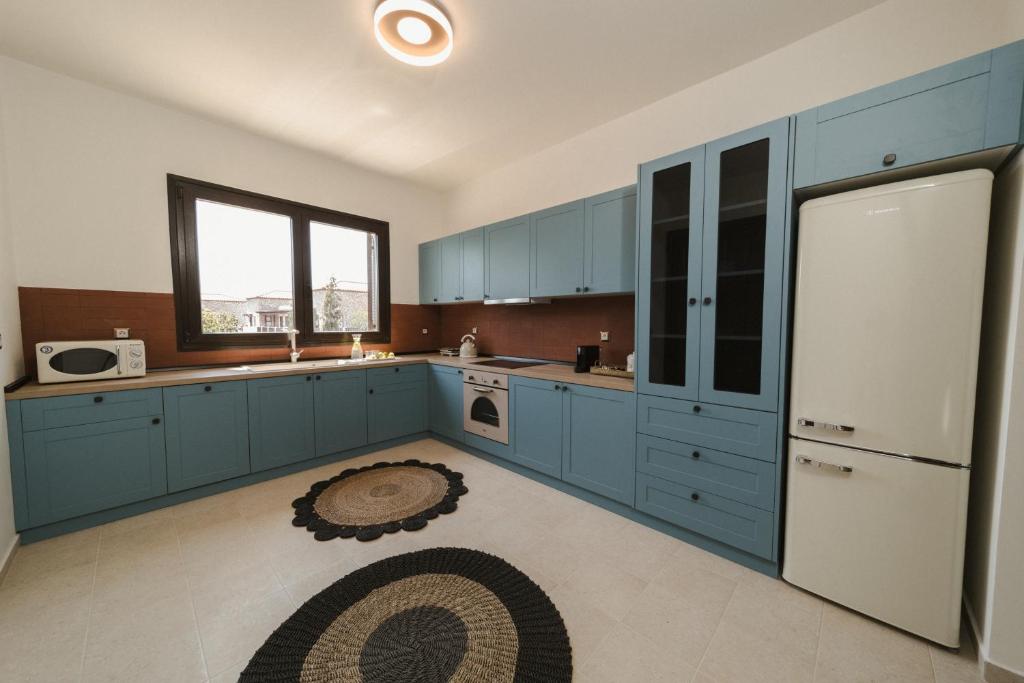 Η κουζίνα ή μικρή κουζίνα στο Pura Vida Beach House