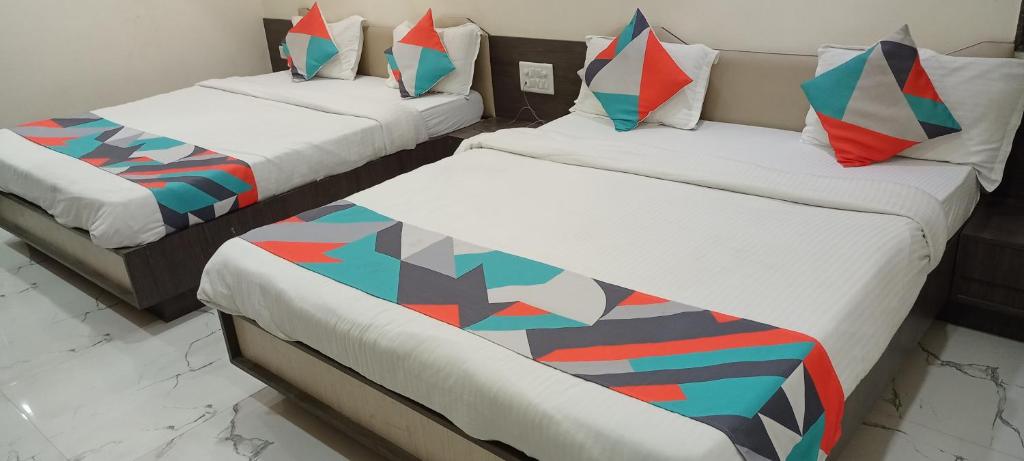 Postel nebo postele na pokoji v ubytování Hotel Palliate