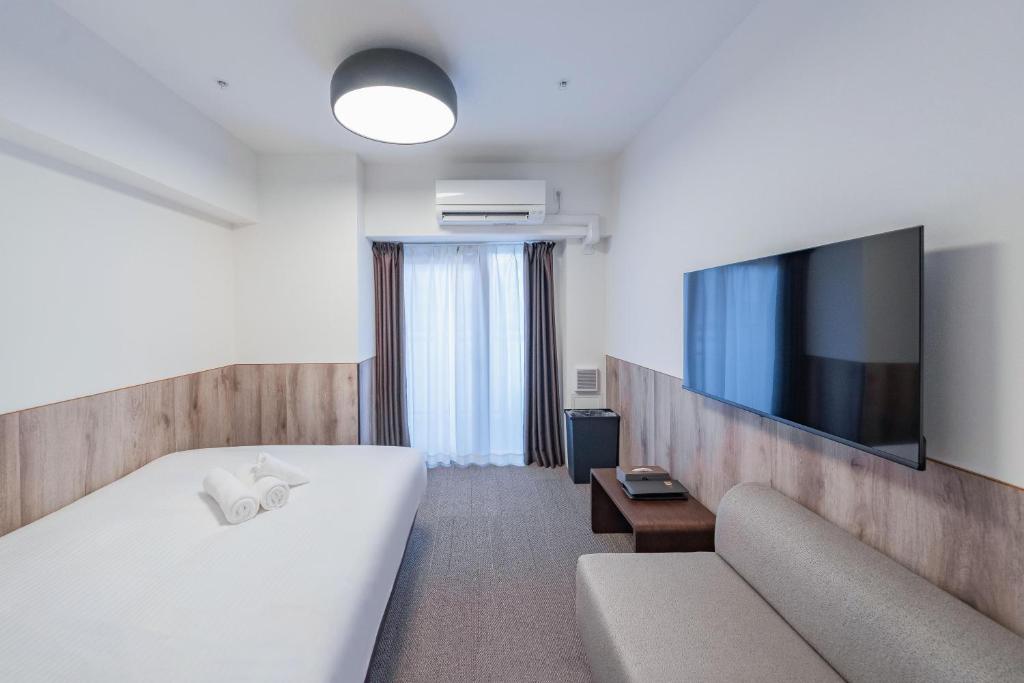 Apartment Hotel 11 Nagoya TV 또는 엔터테인먼트 센터