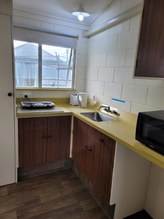 Garden Court Motel & Backpackers - Resim 22