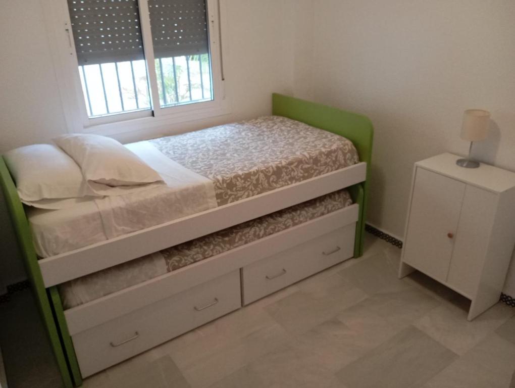 Postel nebo postele na pokoji v ubytování Apartamento Alextia La Barrosa