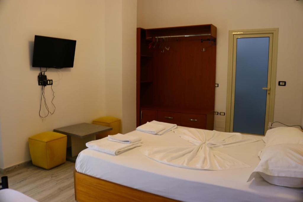 Postel nebo postele na pokoji v ubytování Hotel Vila Stefa