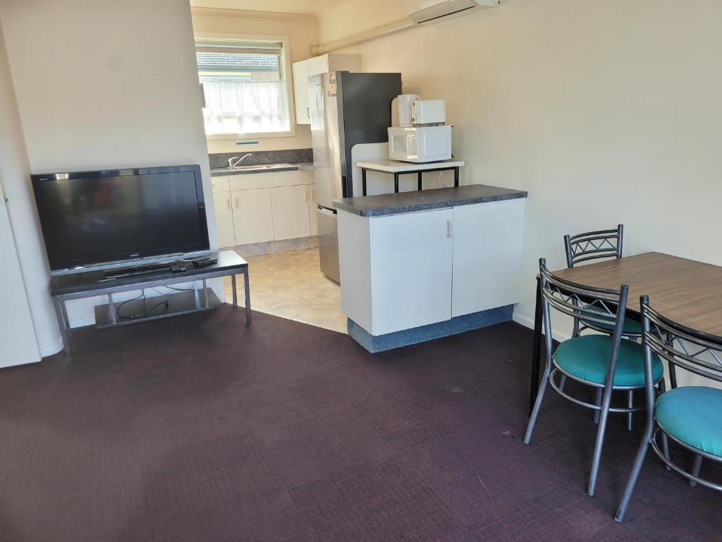Garden Court Motel & Backpackers - Resim 14