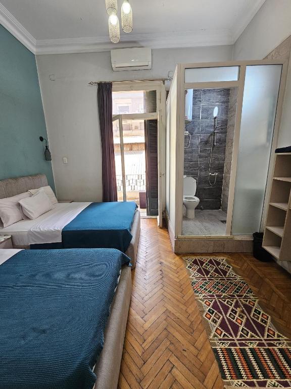 Postel nebo postele na pokoji v ubytování Cheers Hostel Cairo