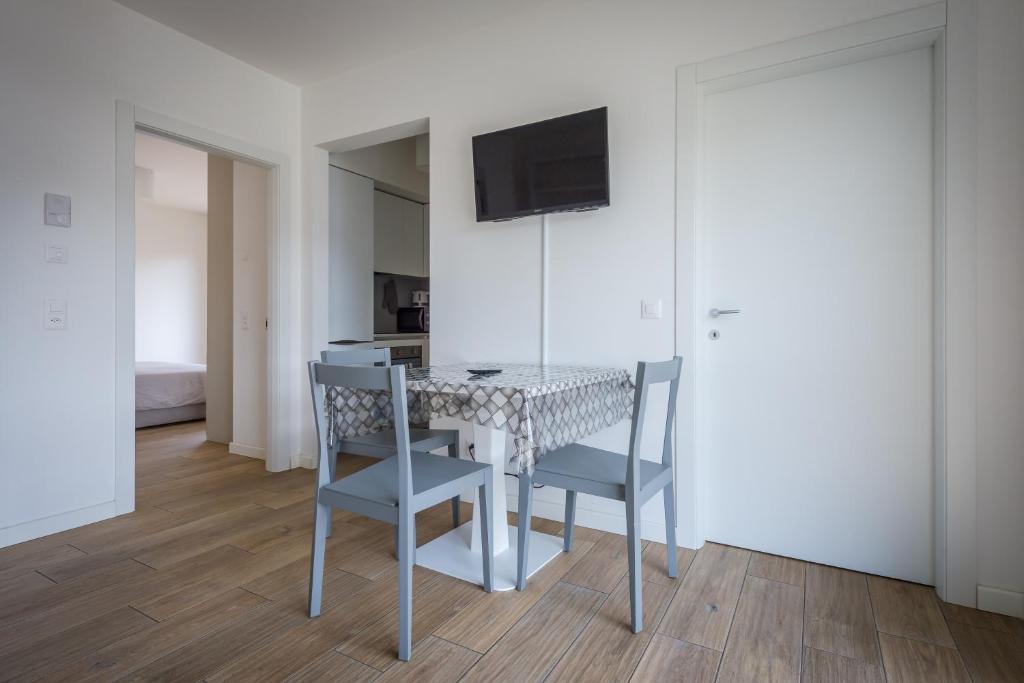 TV a/nebo společenská místnost v ubytování Viganello Modern Apartment
