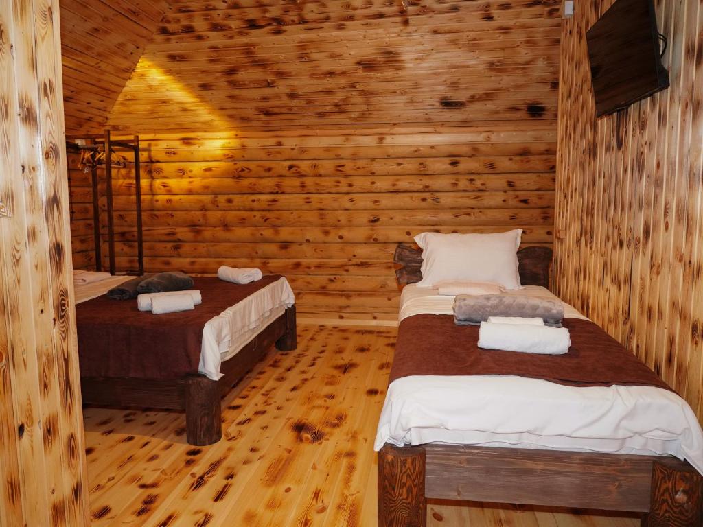 Postel nebo postele na pokoji v ubytování Davitiani