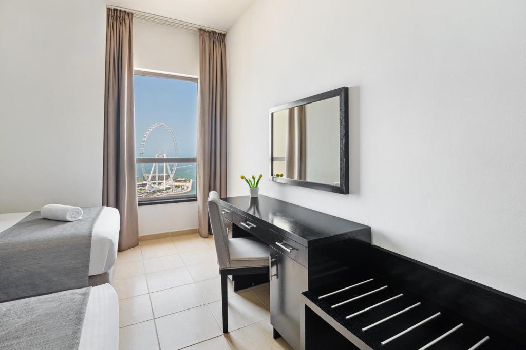Postel nebo postele na pokoji v ubytování Stunning Full Sea View 3BR Apartment on JBR Beach - By Sunkissed Holiday Homes