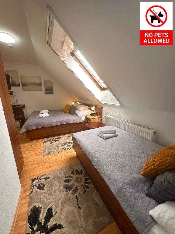 Postel nebo postele na pokoji v ubytování Le Rose Suites & Park Hotel